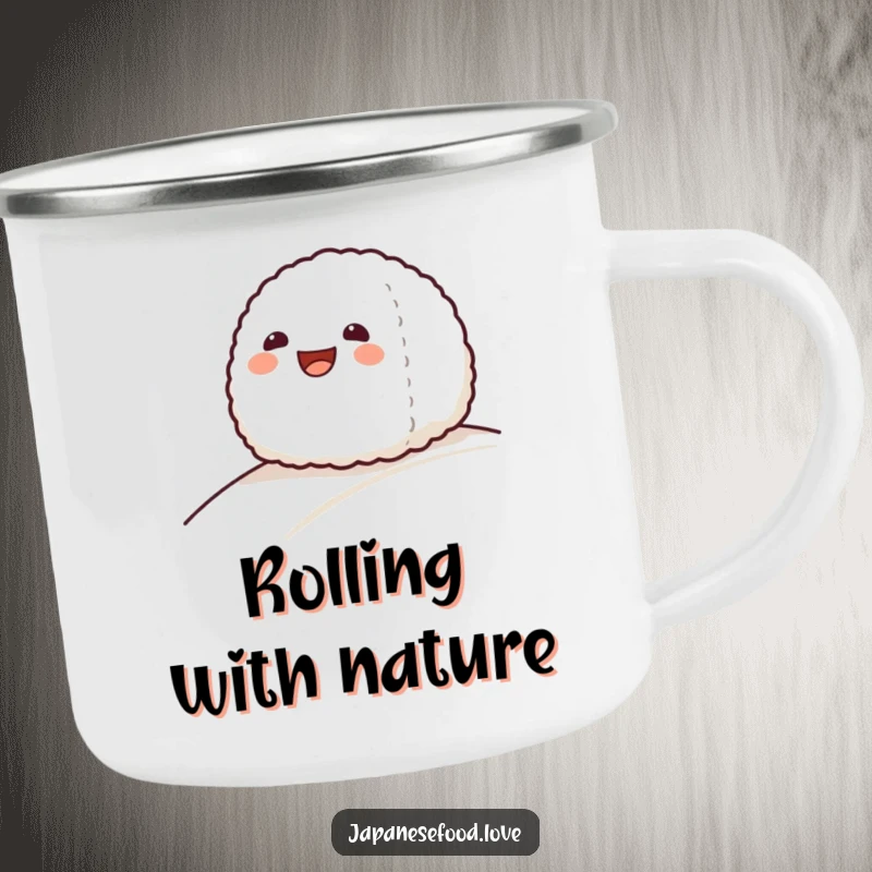 Funny camping mug with a grinning onigiri rice ball character sliding down a gentle slope, ready for the outdoors.
