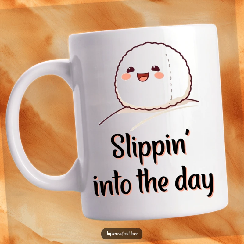 Funny mug featuring a grinning onigiri rice ball happily sliding down a gentle slope, a delightful food character.