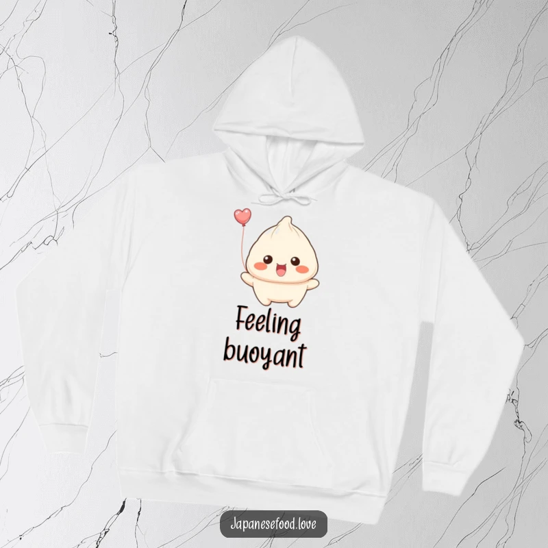 Funny dumpling with wide smile attempting to float away like a balloon on a hoodie, providing cozy, whimsical comfort.