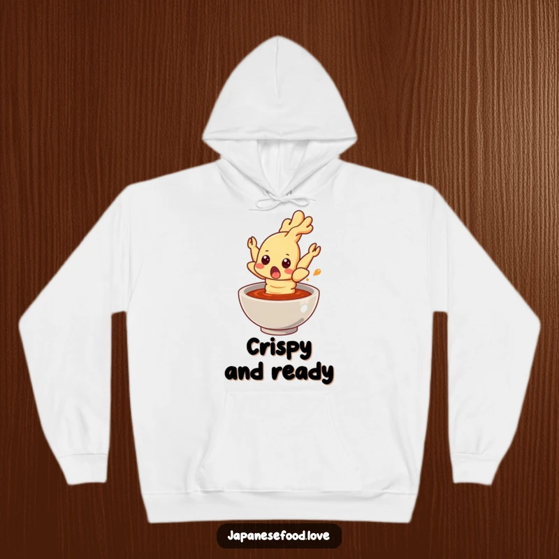 Funny tempura shrimp hoodie, comically surprised and jumping out of a sauce bowl, a warm and humorous foodie apparel item.