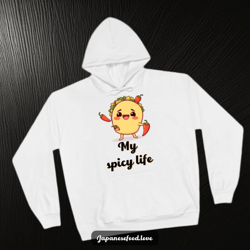Funny hoodie with a smiling taco awkwardly juggling three chili peppers, a warm and humorous design for spicy food fans.